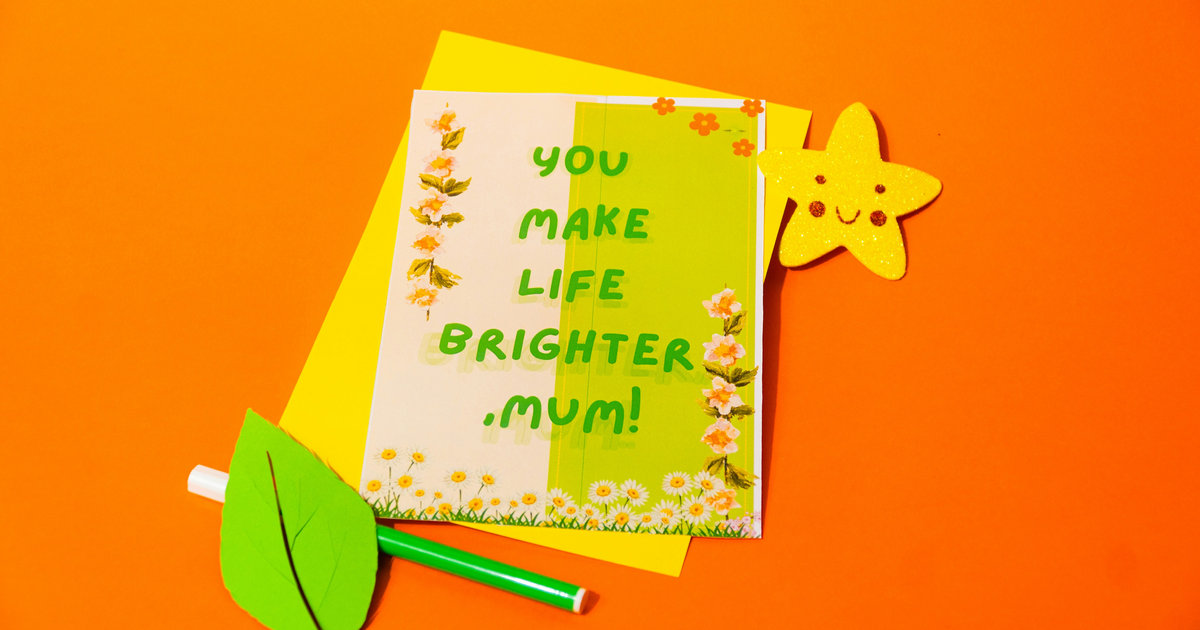 Handmade cards on a bright orange background reading “You make life brighter, Mum.”